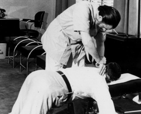 A physical therapist applying manual therapy.