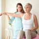 Therapist demonstrating proper posture during physio.