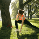 Woman doing kinesiology exercises at the park