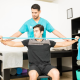 Patient using resistance bands in physical therapy.